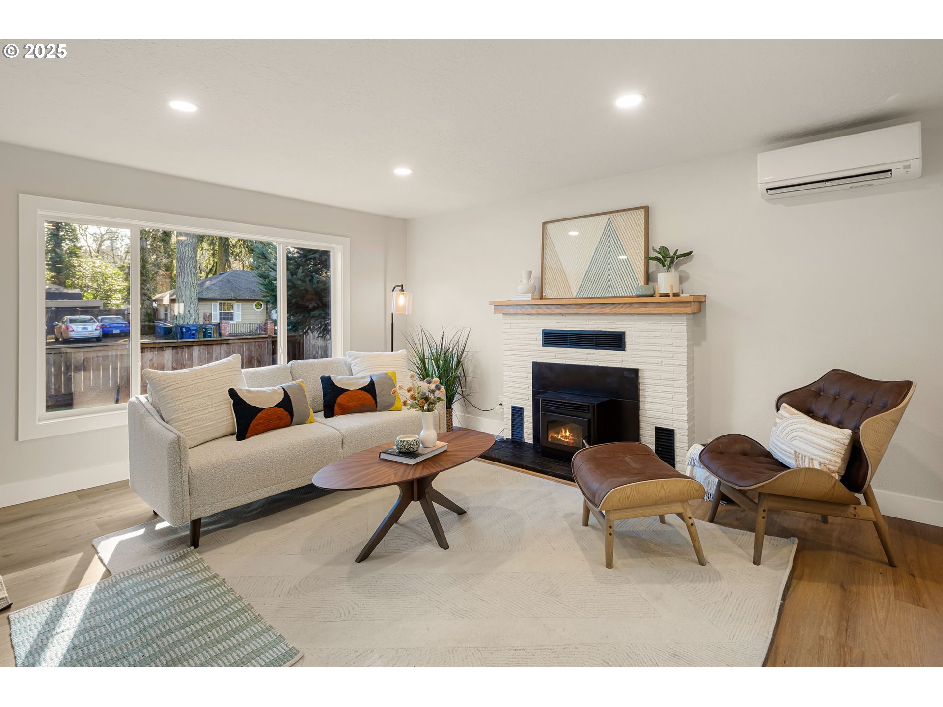 1489 Cal Young Road Eugene, OR 97401 - Photo 14 of 47 a living room with furniture and a fireplace