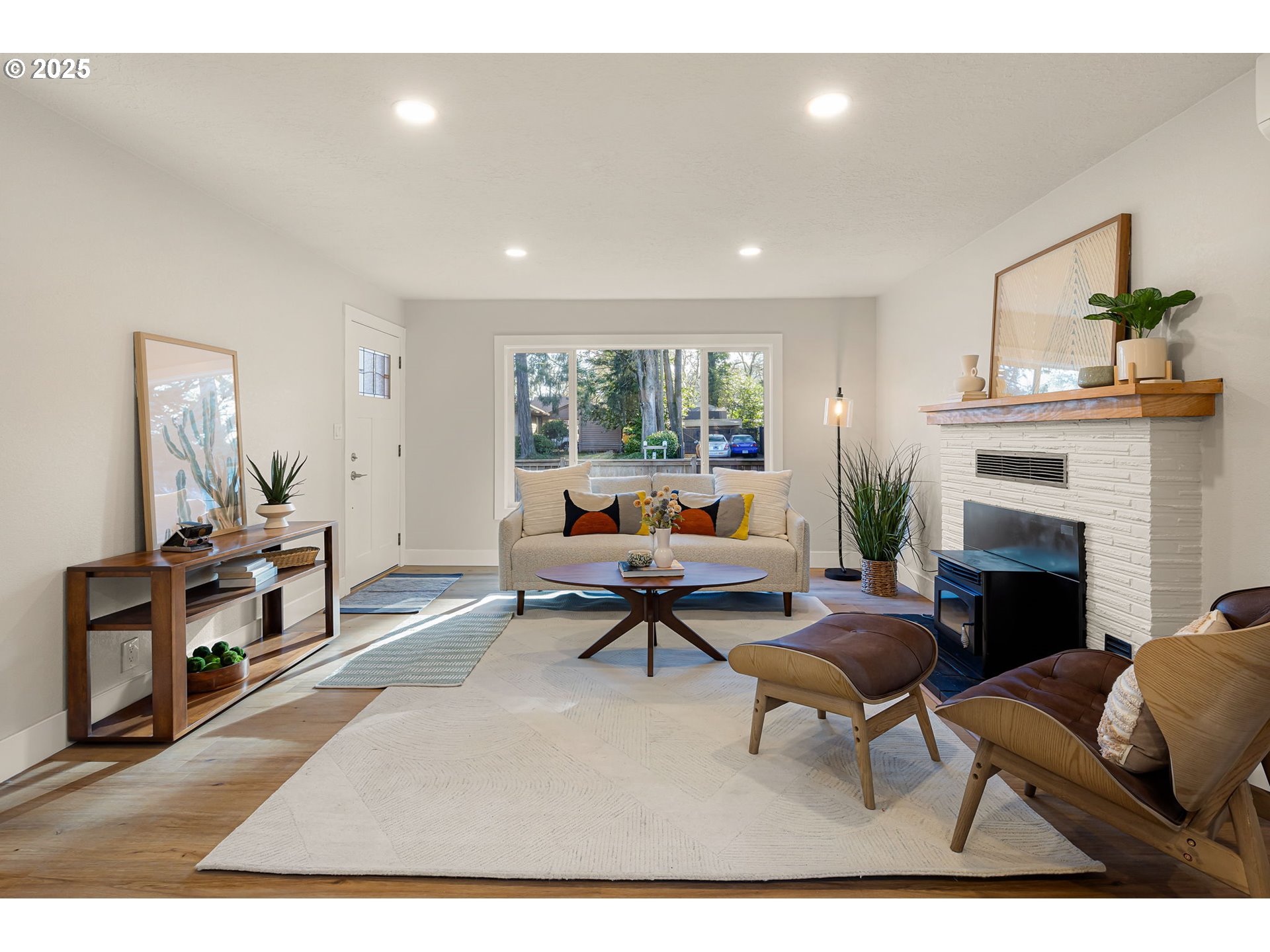 1489 Cal Young Road Eugene, OR 97401 - Photo 16 of 47 a living room with furniture and a fireplace