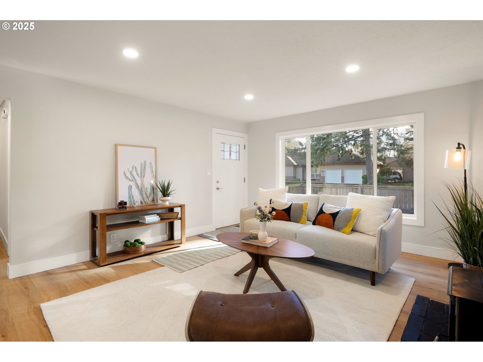 1489 Cal Young Road Eugene, OR 97401 - Photo 17 of 47 a living room with furniture and a potted plant