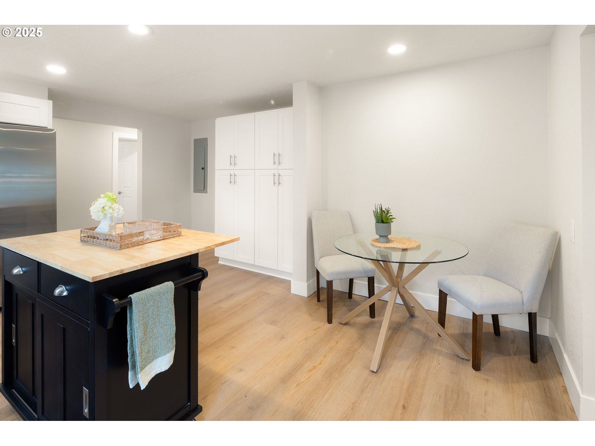 1489 Cal Young Road Eugene, OR 97401 - Photo 22 of 47 a kitchen with a table and chairs in it
