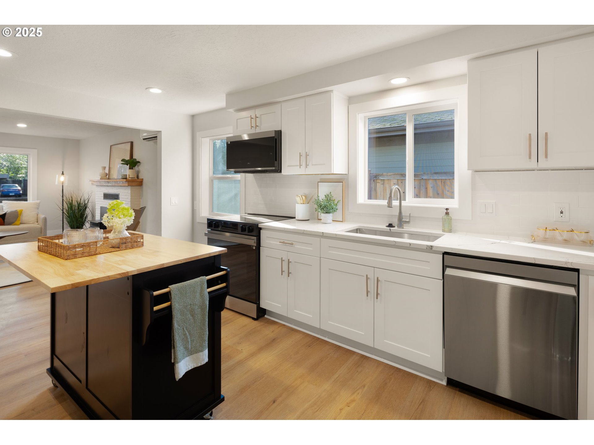 1489 Cal Young Road Eugene, OR 97401 - Photo 23 of 47 a kitchen with a sink and cabinets
