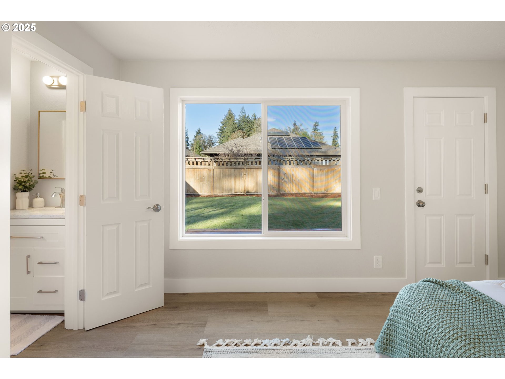 1489 Cal Young Road Eugene, OR 97401 - Photo 27 of 47 a view of a bedroom with furniture and windows