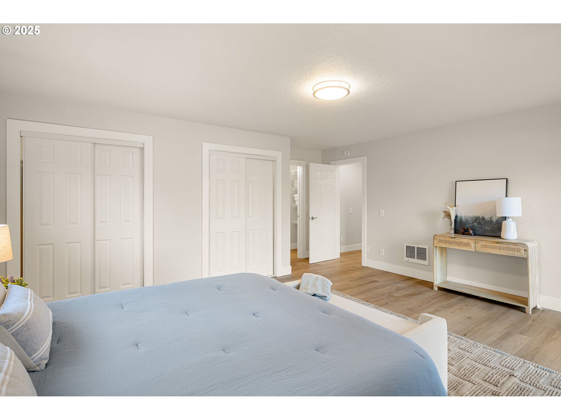 1489 Cal Young Road Eugene, OR 97401 - Photo 31 of 47 a living room with a bed furniture and mirror