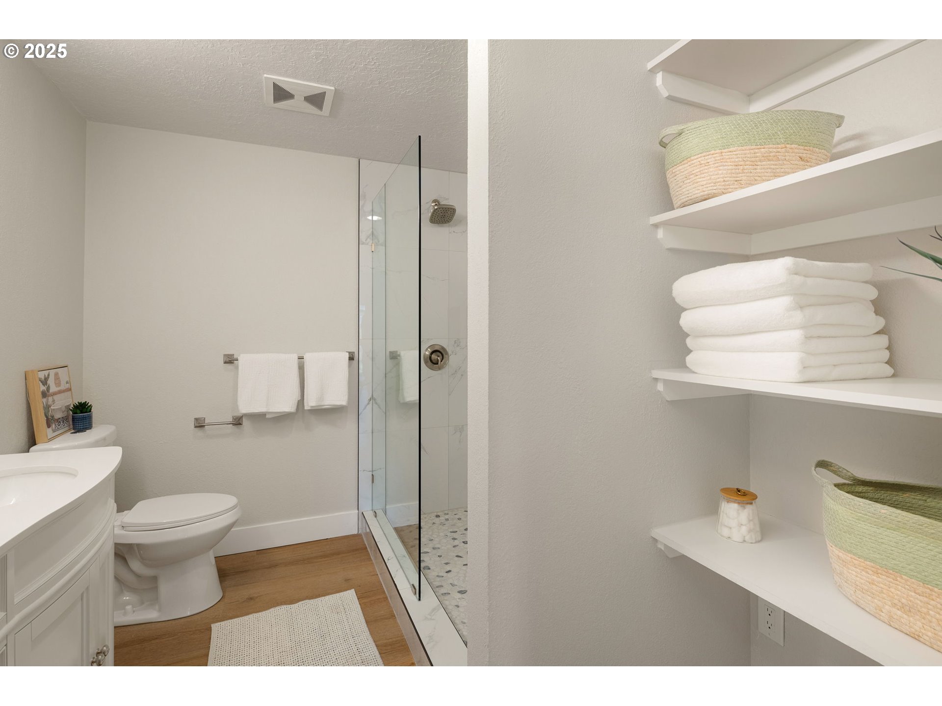 1489 Cal Young Road Eugene, OR 97401 - Photo 32 of 47 a bathroom with a sink a toilet and a shower