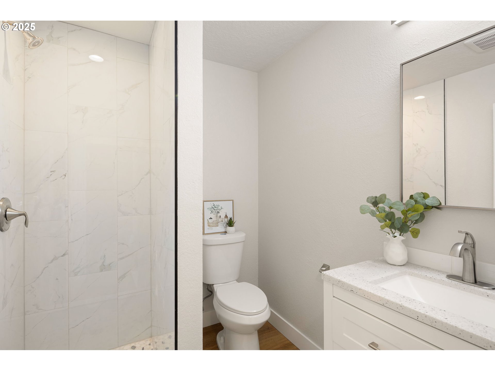1489 Cal Young Road Eugene, OR 97401 - Photo 36 of 47 a bathroom with a granite countertop sink toilet and a mirror