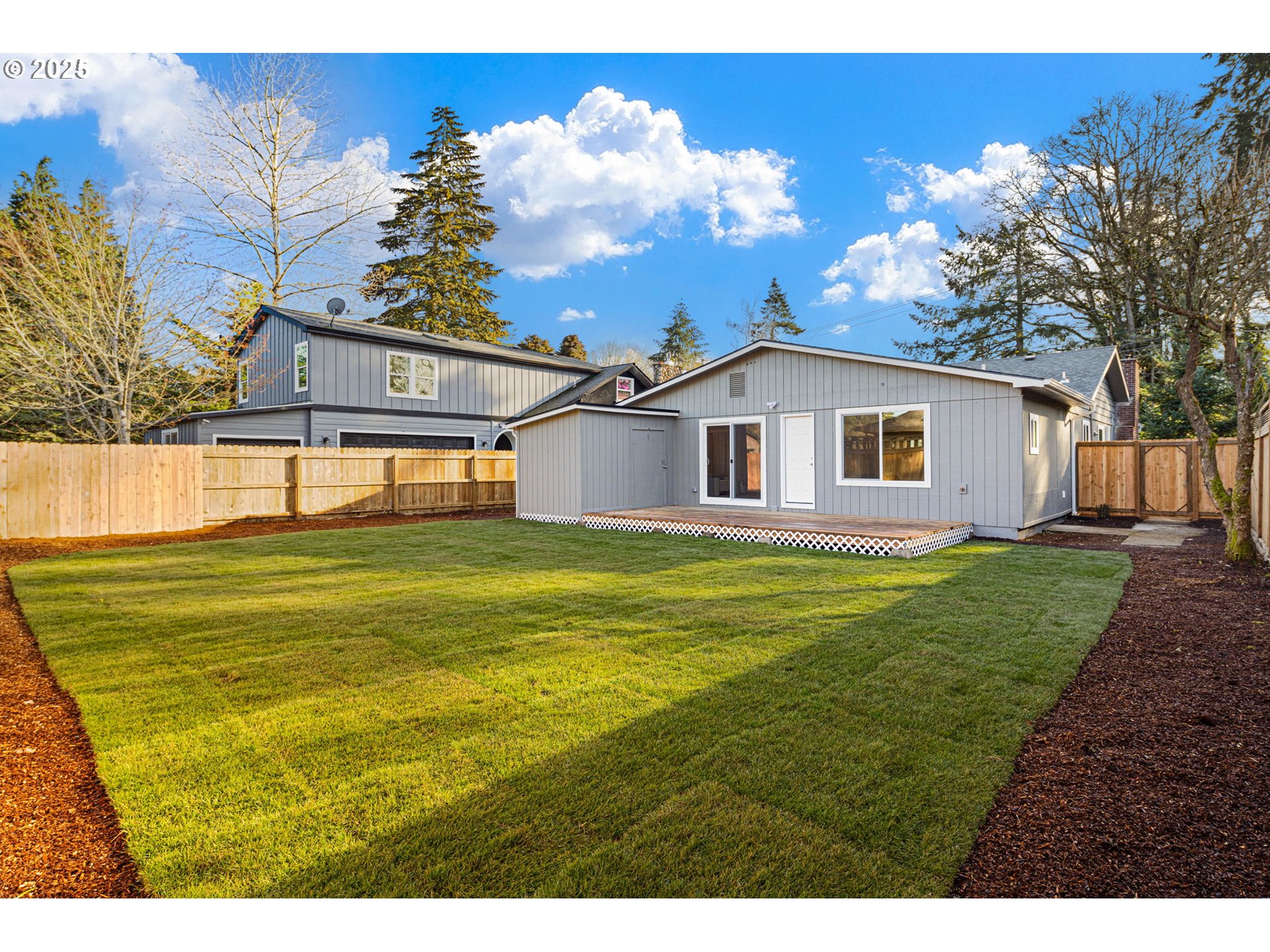 1489 Cal Young Road Eugene, OR 97401 - Photo 43 of 47 a view of a house with a backyard
