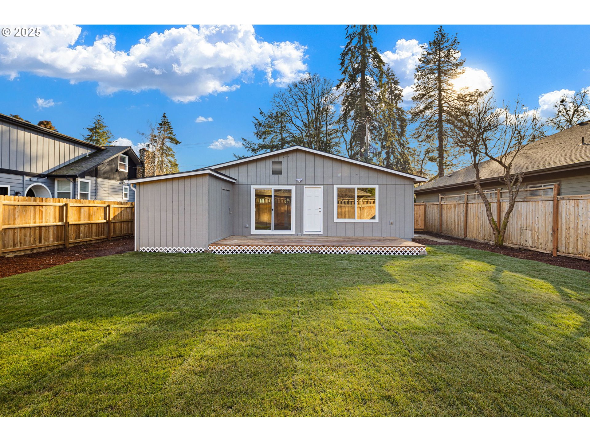1489 Cal Young Road Eugene, OR 97401 - Photo 44 of 47 a view of a house with a backyard