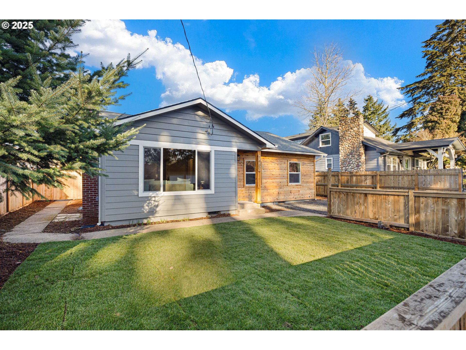 1489 Cal Young Road Eugene, OR 97401 - Photo 5 of 47 a view of a house with a swimming pool