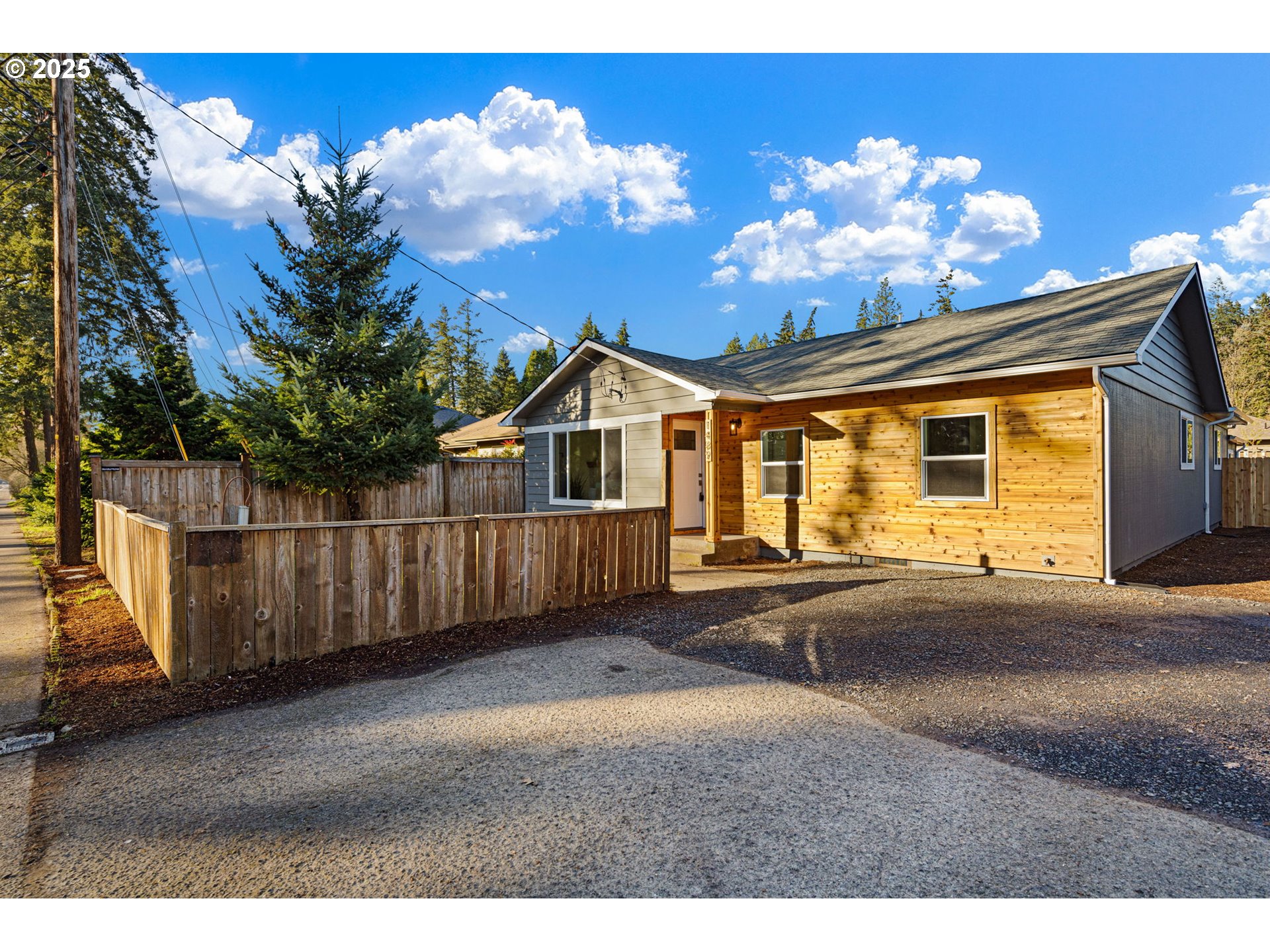 1489 Cal Young Road Eugene, OR 97401 - Photo 7 of 47 a view of a house with a yard