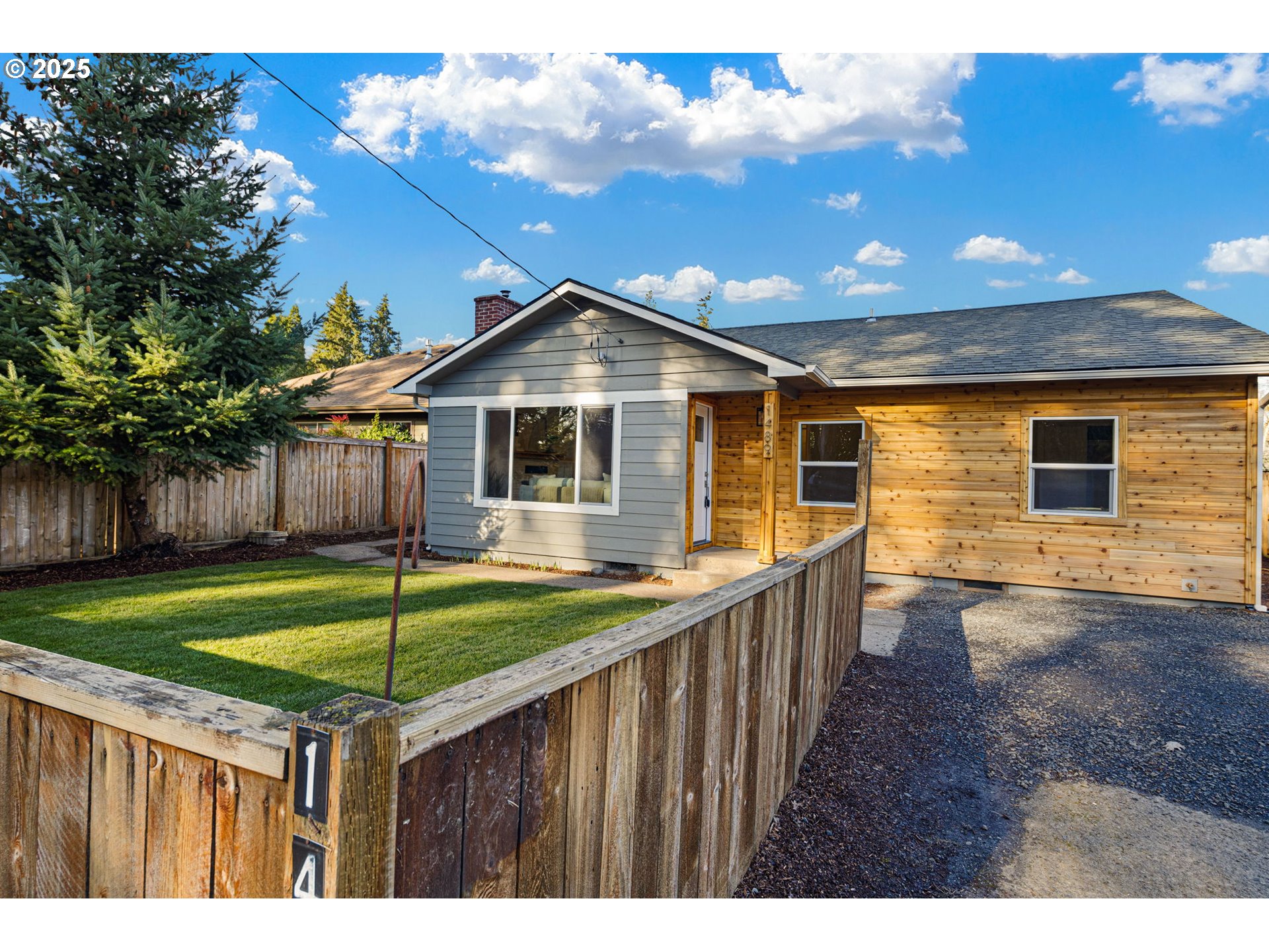 1489 Cal Young Road Eugene, OR 97401 - Photo 8 of 47 a front view of a house with garden