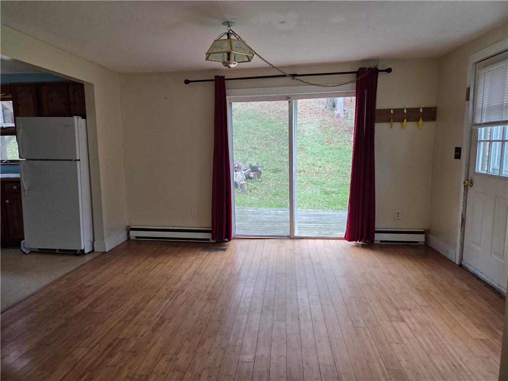 443 County Highway Worcester, NY 12197 - Photo 10 of 27 Living room view of dining room