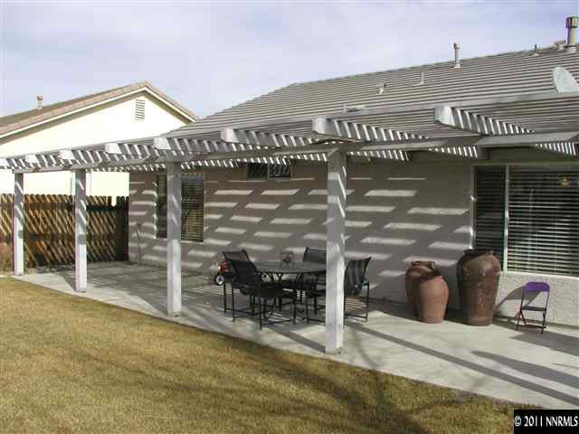 10585 Arbor Way Reno, NV 89521 - Photo 11 of 13 a view of a house with a outdoor space