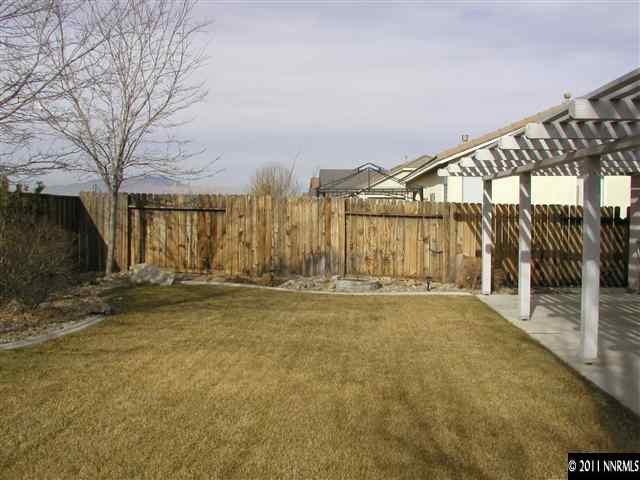 10585 Arbor Way Reno, NV 89521 - Photo 12 of 13 a view of an empty room with wooden fence