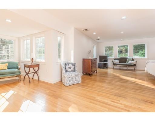 101 Hundreds Road Wellesley, MA 02481 - Photo 11 of 29 a living room with furniture and a table