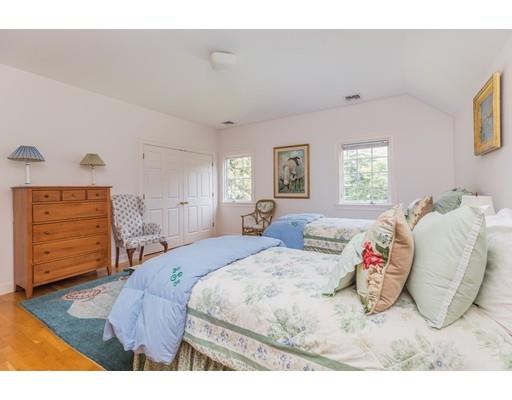 101 Hundreds Road Wellesley, MA 02481 - Photo 17 of 29 a bedroom with a bed and a dresser