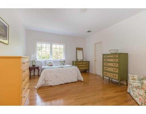 101 Hundreds Road Wellesley, MA 02481 - Photo 18 of 29 a living room with furniture and a flat screen tv