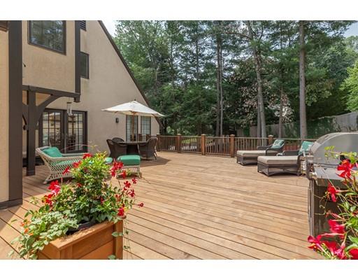 101 Hundreds Road Wellesley, MA 02481 - Photo 23 of 29 a outdoor space with lots of potted plants