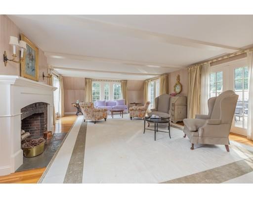 101 Hundreds Road Wellesley, MA 02481 - Photo 3 of 29 a living room with furniture and a fireplace