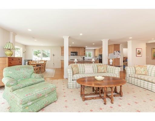 101 Hundreds Road Wellesley, MA 02481 - Photo 6 of 29 a living room with furniture and a table