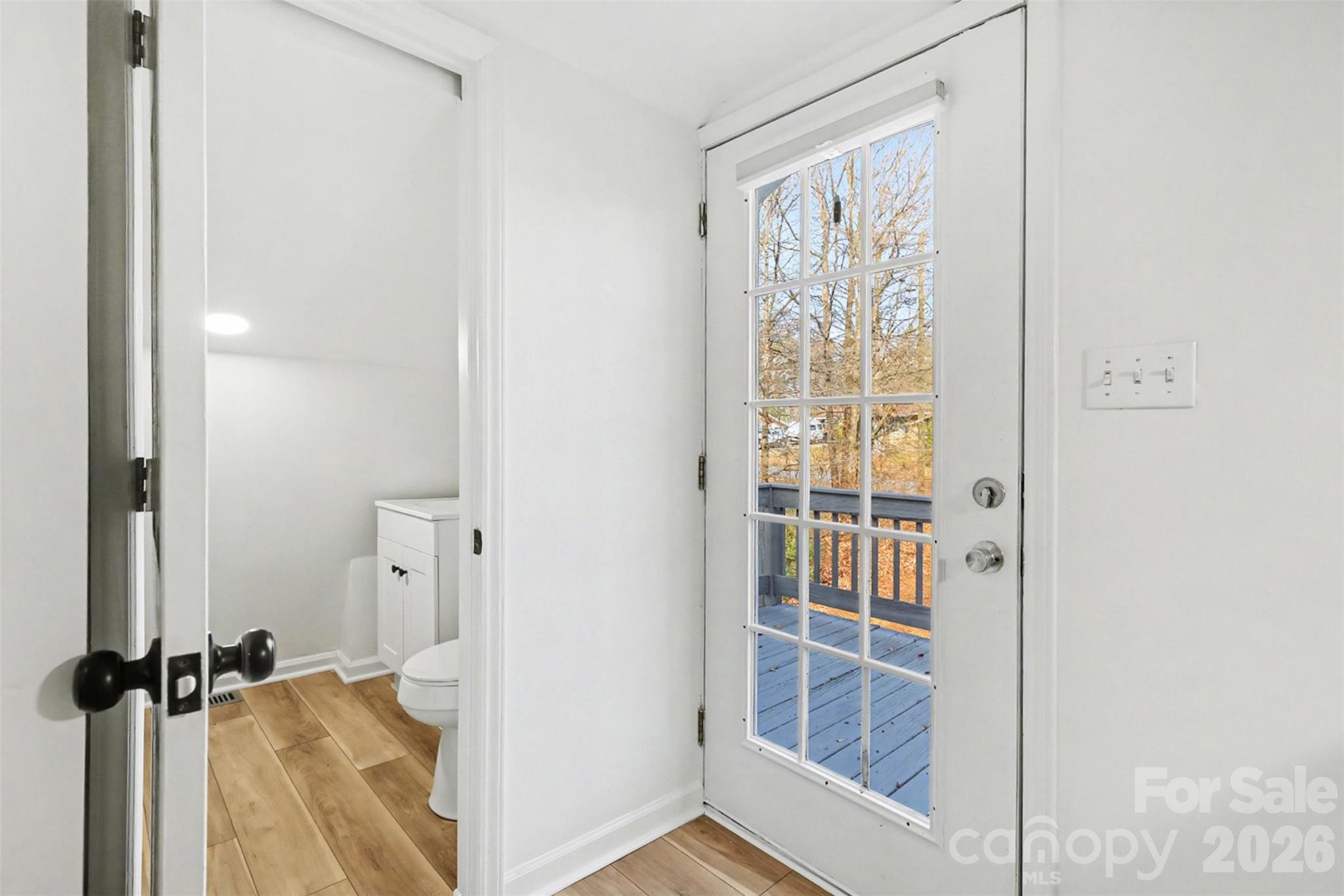 655 Ridgecrest Drive Mooresville, NC 28115 - Photo 4 of 16 a view of a bathroom with a shower and a window