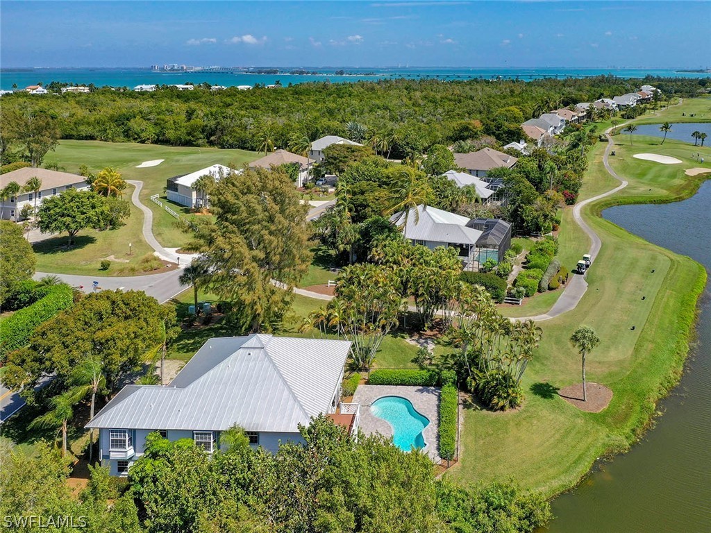 1573 Sand Castle Road Sanibel, FL 33957 - Photo 12 of 31 an aerial view of a house with a garden