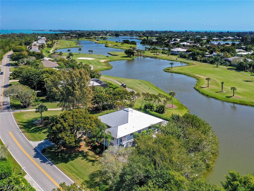1573 Sand Castle Road Sanibel, FL 33957 - Photo 13 of 31 an aerial view of a residential houses with outdoor space and lake view