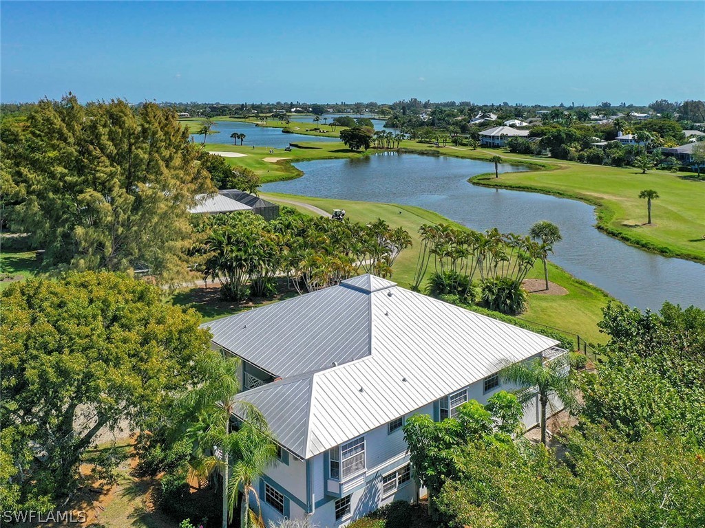 1573 Sand Castle Road Sanibel, FL 33957 - Photo 14 of 31 an aerial view of a house with a lake view