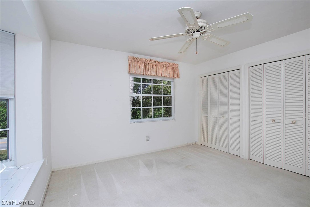 1573 Sand Castle Road Sanibel, FL 33957 - Photo 23 of 31 a view of an empty room with a window