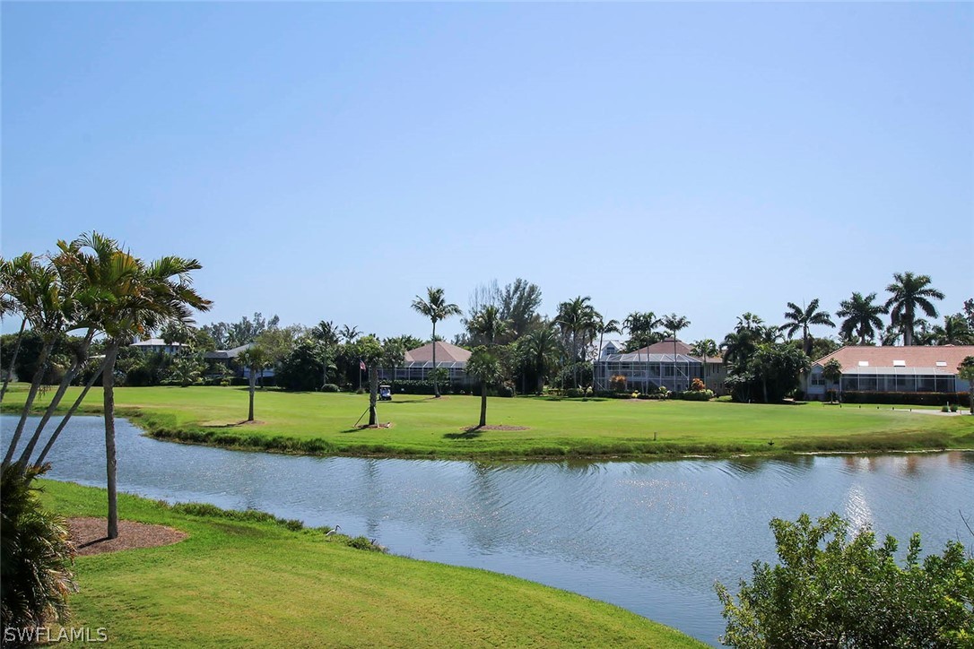 1573 Sand Castle Road Sanibel, FL 33957 - Photo 3 of 31 a view of a lake with a large trees