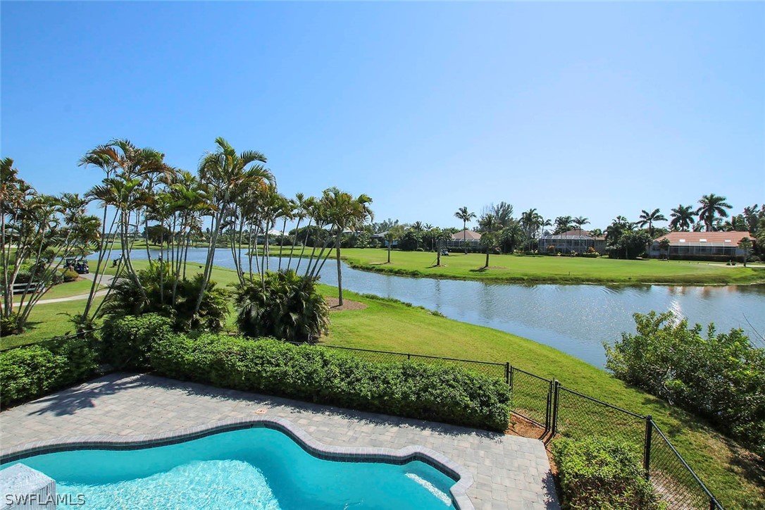 1573 Sand Castle Road Sanibel, FL 33957 - Photo 4 of 31 a view of a lake with a garden