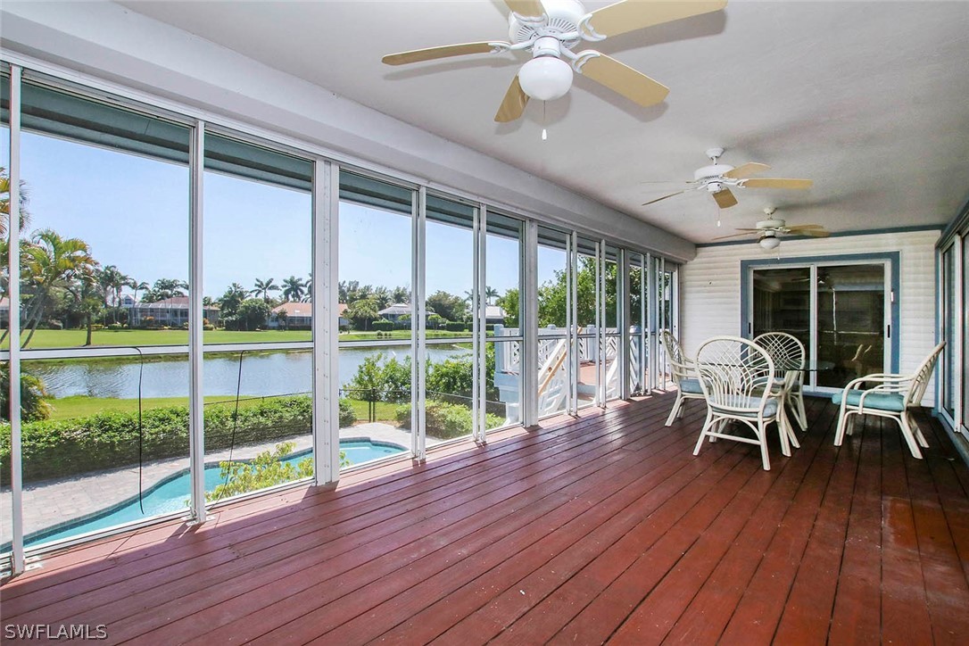 1573 Sand Castle Road Sanibel, FL 33957 - Photo 10 of 31 a view of a dining room with furniture window and wooden floor