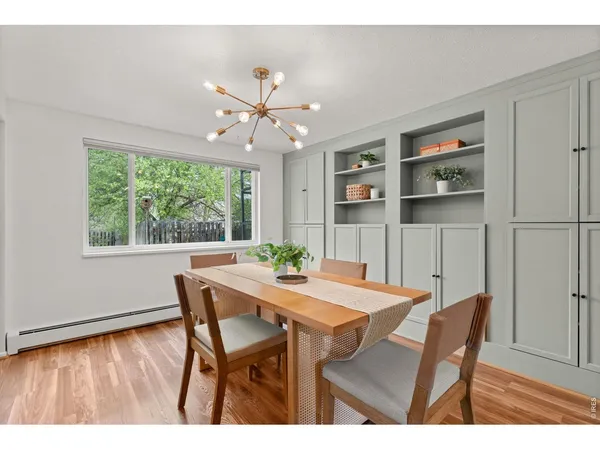 a hallway with a bench in front of it