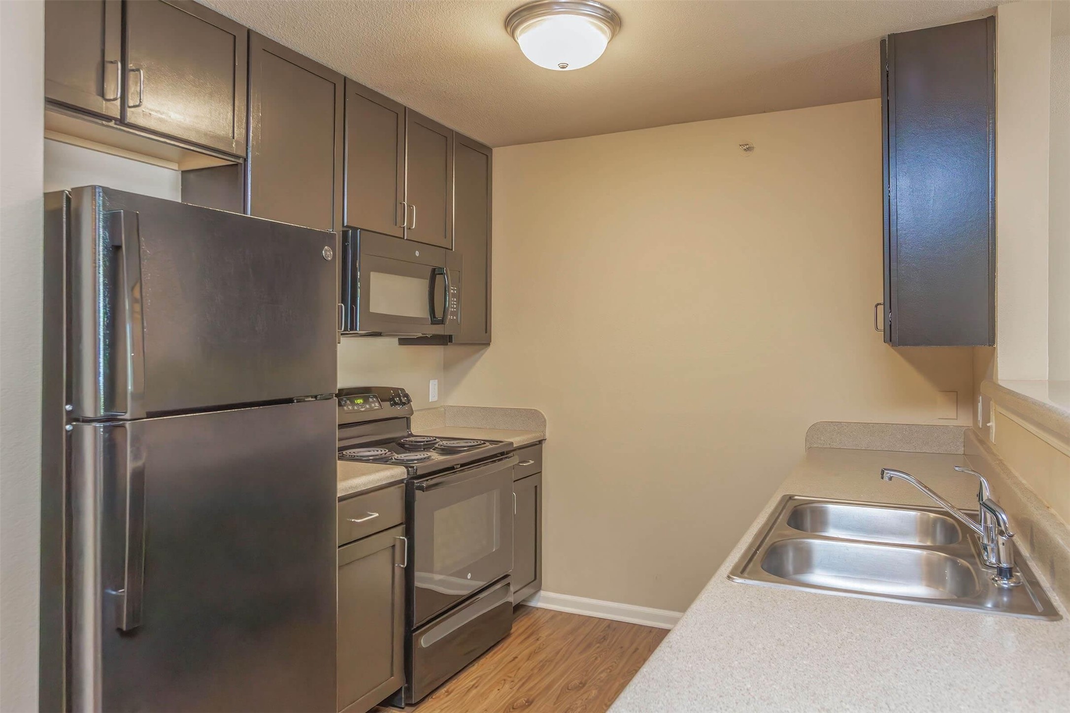 11320 Greenwell Springs Road Baton Rouge, LA 70814 - Photo 13 of 19 a kitchen with stainless steel appliances a refrigerator and a sink