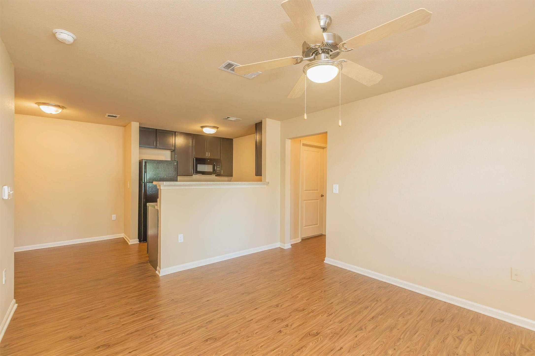 11320 Greenwell Springs Road Baton Rouge, LA 70814 - Photo 15 of 19 a view of a kitchen with a sink and a refrigerator