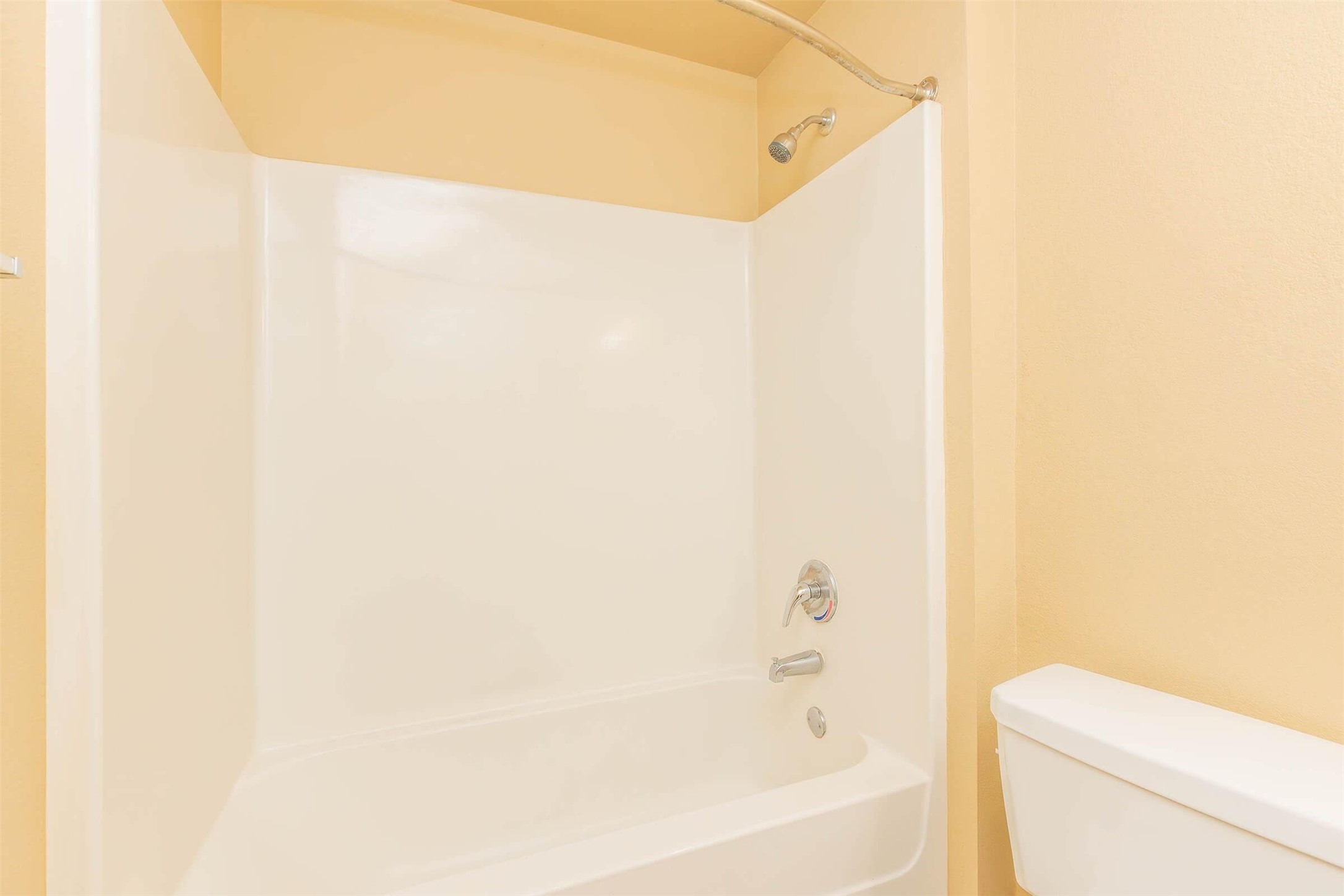 11320 Greenwell Springs Road Baton Rouge, LA 70814 - Photo 18 of 19 a bathroom with a bathtub and a toilet