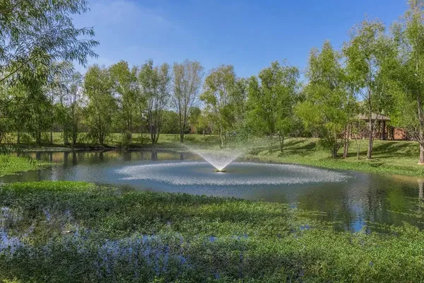 a view of a lake view with a yard