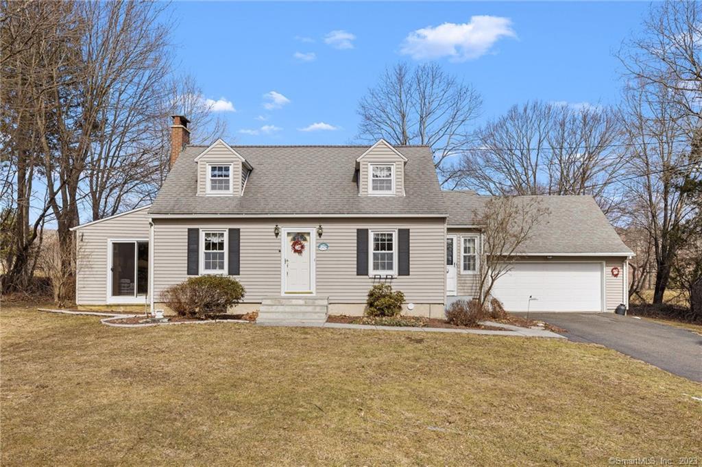 a house with trees in front of it