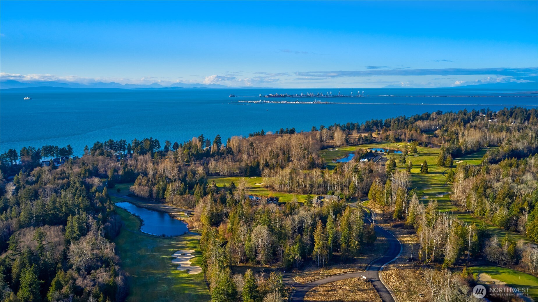 230 Iris Boulevard Point Roberts, WA 98281 - Photo 2 of 15 a view of a city with an ocean