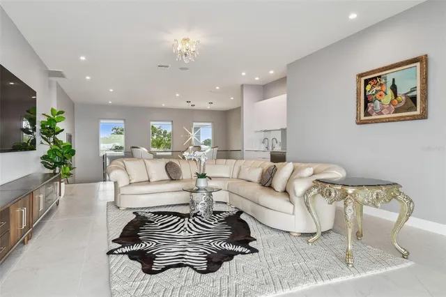 a view of a chairs and table in patio