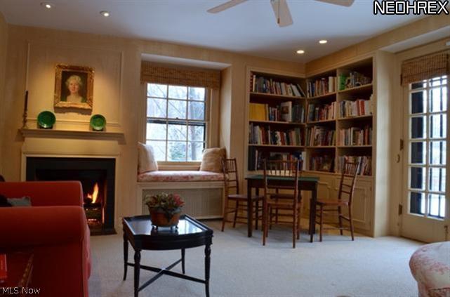 2341 Roxboro Road Cleveland Heights, OH 44106 - Photo 16 of 20 Retire to the upstairs Family Room with built-in bookshelves, fireplace and French doors to a large ironwork balcony. Can also be used as the fourth second floor bedroom.