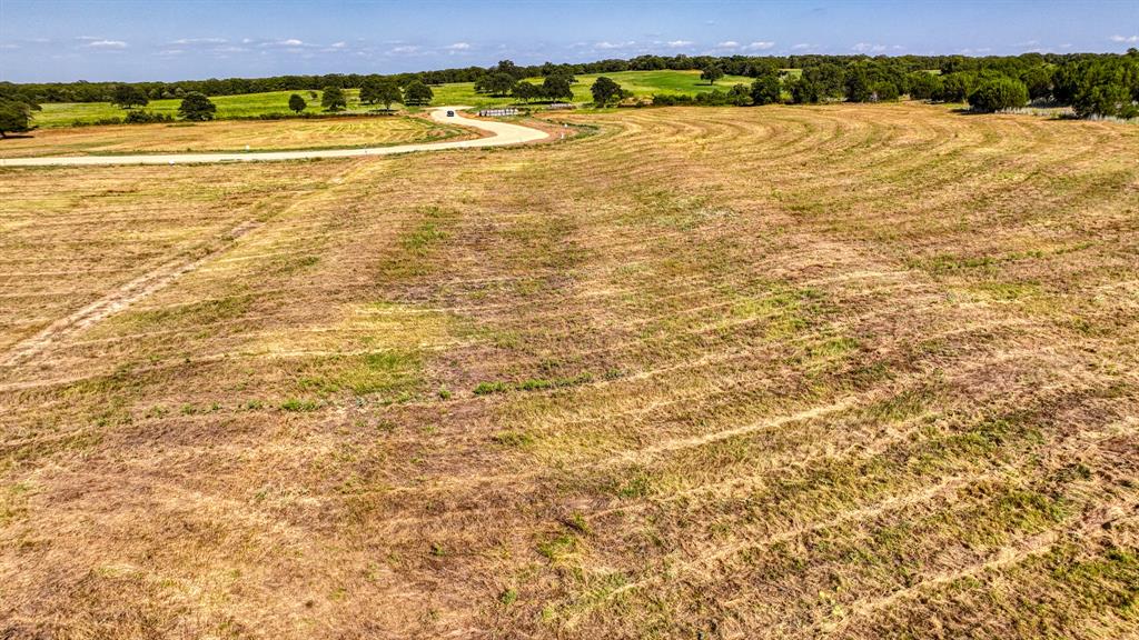 Lot 9-10 Three Quarter Loop Poolville, TX 76487 - Photo 7 of 14 a view of an ocean and beach