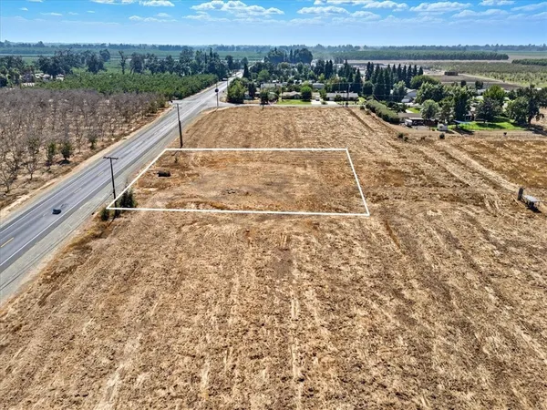 a view of a terrace with yard