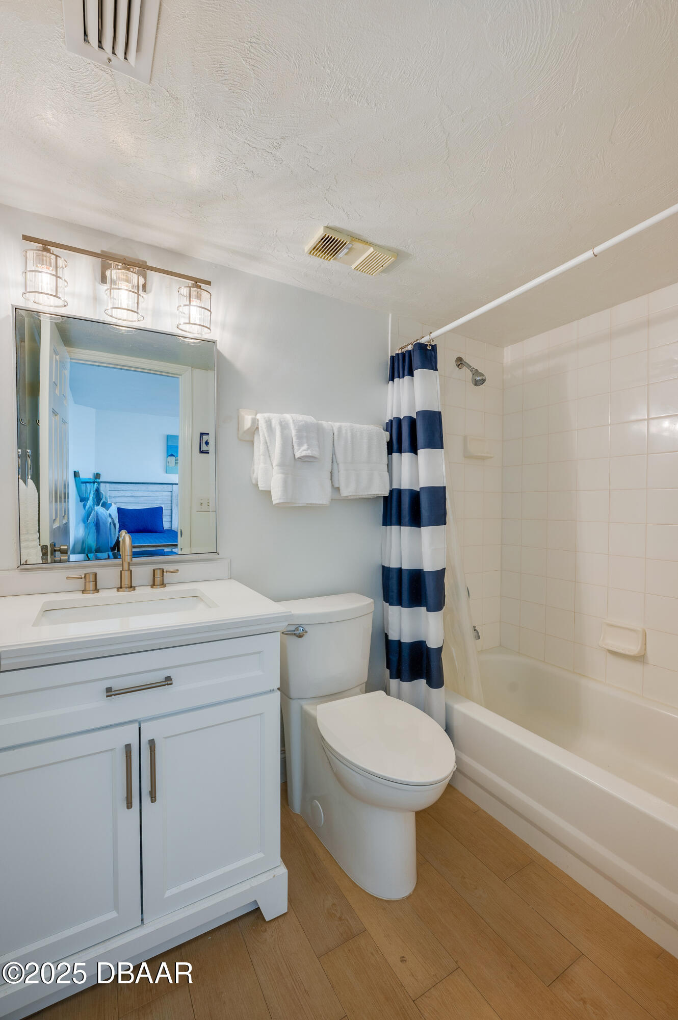 4545 South Atlantic Avenue, Unit 3206 Ponce Inlet, FL 32127 - Photo 28 of 35 a bathroom with a toilet a sink and a bathtub