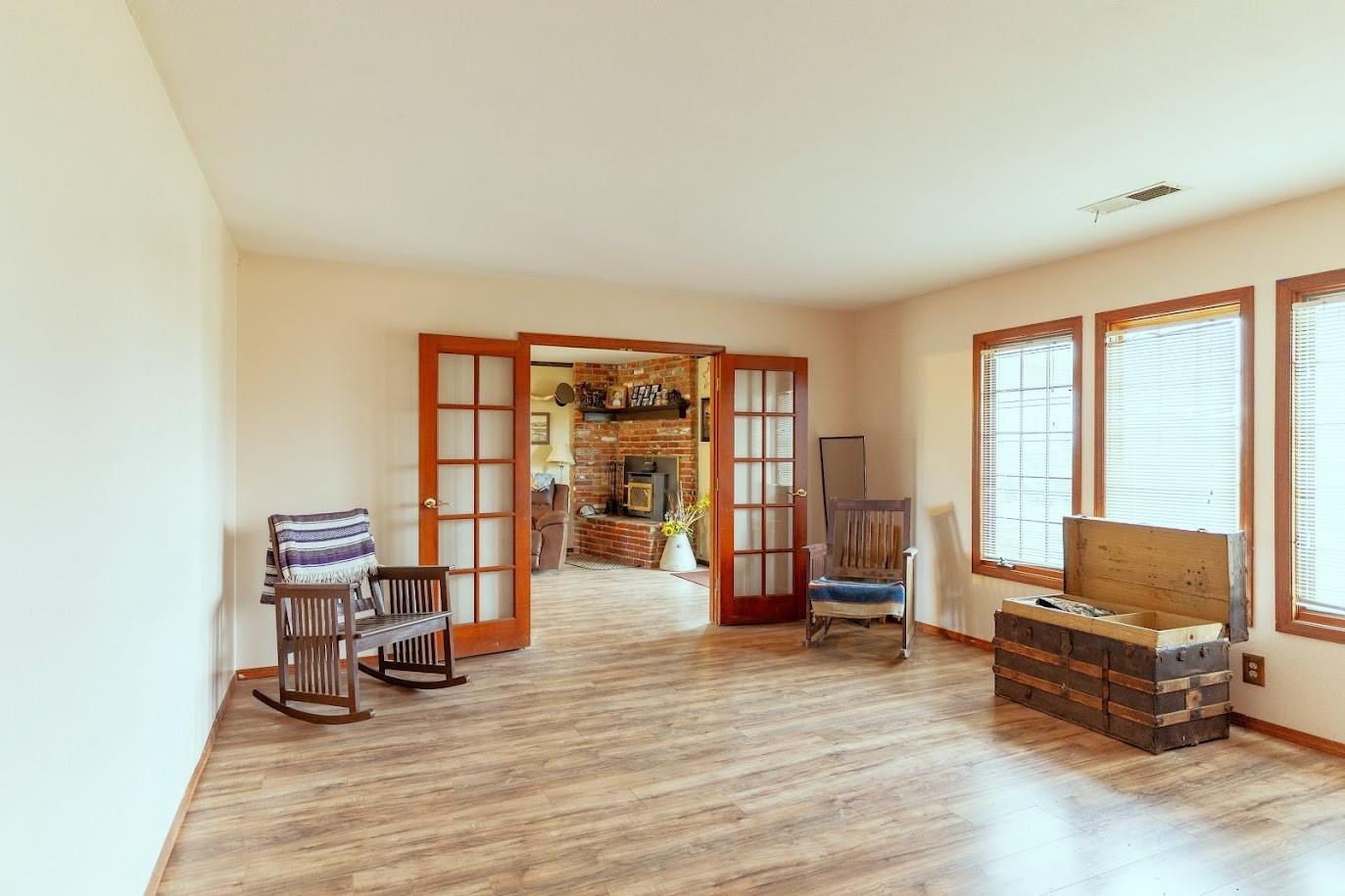 11175 East South Avenue Del Rey, CA 93616 - Photo 12 of 31 a view of a bedroom with furniture and windows