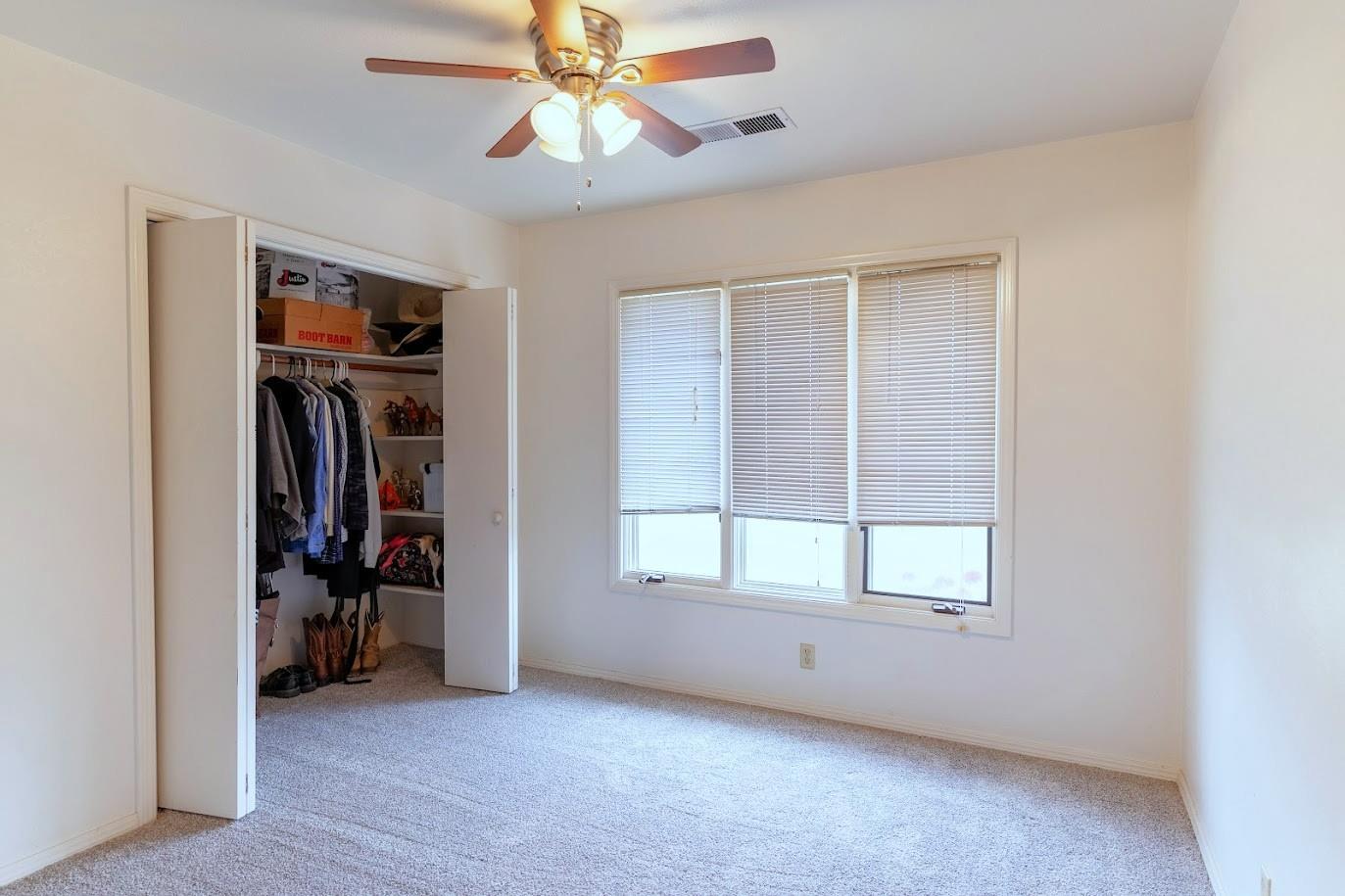 11175 East South Avenue Del Rey, CA 93616 - Photo 14 of 31 an empty room with closet and a window