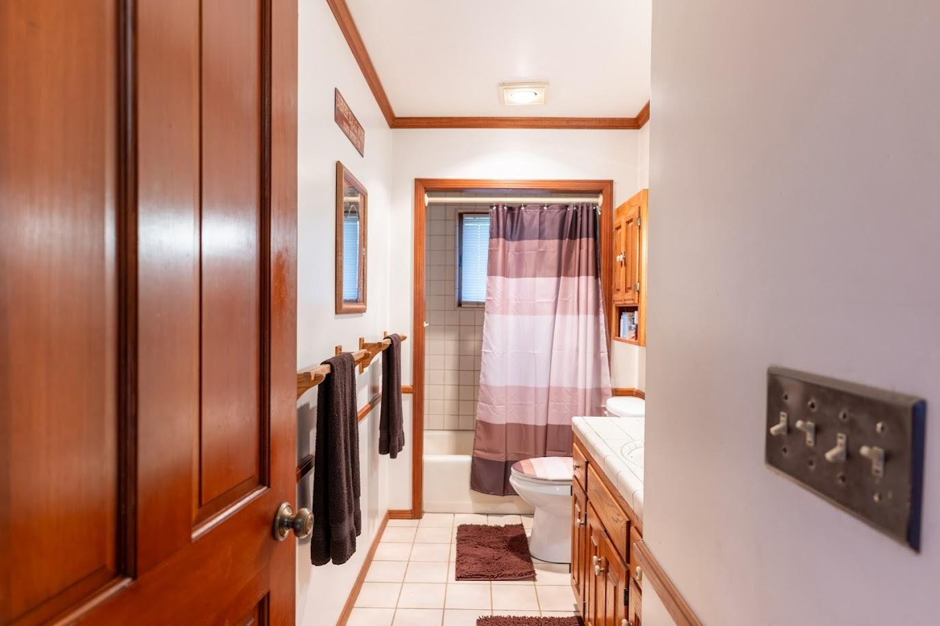 11175 East South Avenue Del Rey, CA 93616 - Photo 15 of 31 a spacious bathroom with a bathtub and a shower