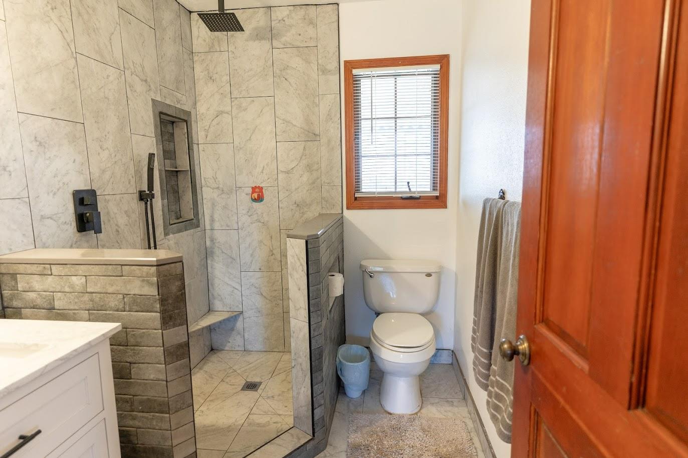 11175 East South Avenue Del Rey, CA 93616 - Photo 21 of 31 a bathroom with a granite countertop sink toilet and shower