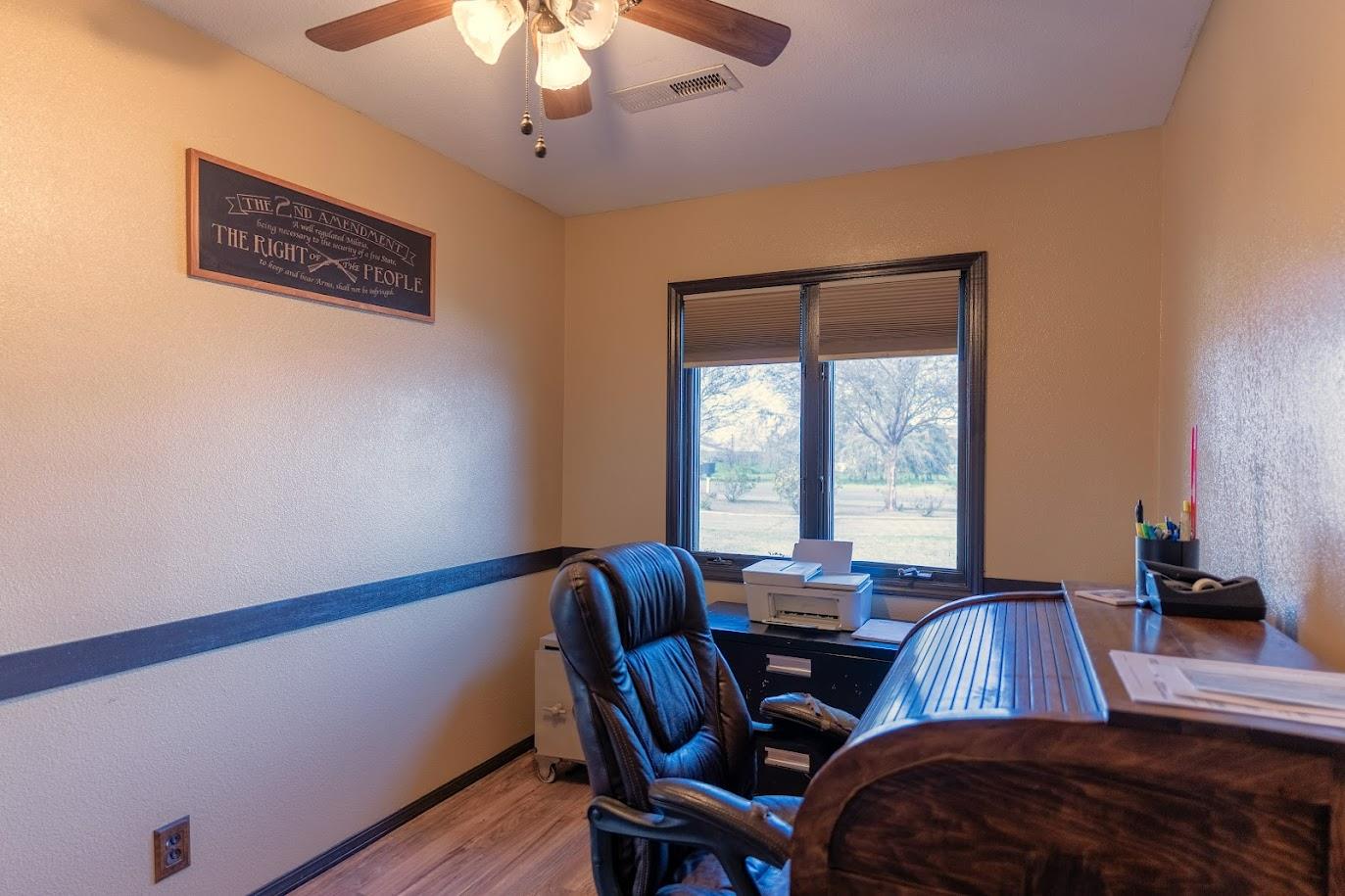 11175 East South Avenue Del Rey, CA 93616 - Photo 23 of 31 a view of a dining room with furniture and wooden floor
