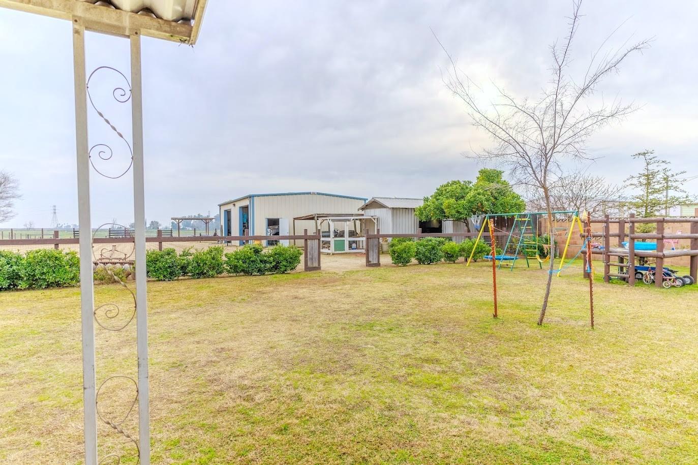 11175 East South Avenue Del Rey, CA 93616 - Photo 25 of 31 a house view with a garden space
