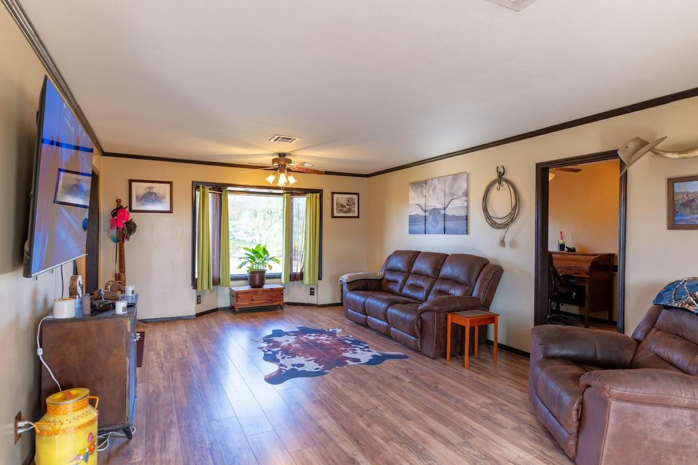 11175 East South Avenue Del Rey, CA 93616 - Photo 10 of 31 a living room with furniture and a window